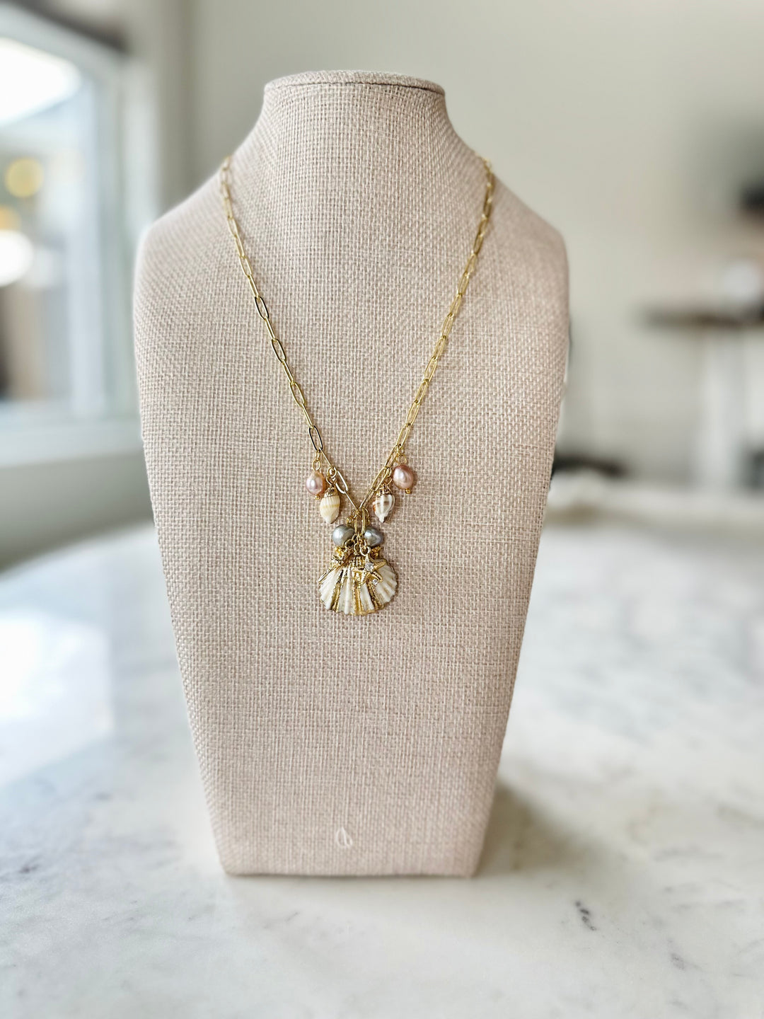 Shell Kissed Gold Plated Charm Necklace-Jewelry-Bloom West Boutique-Shop with Bloom West Boutique, Women's Fashion Boutique, Located in Houma, Louisiana