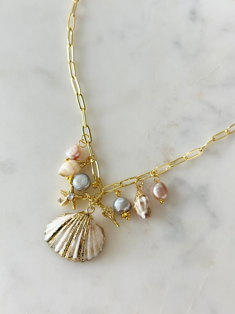 Shell Kissed Gold Plated Charm Necklace-Jewelry-Bloom West Boutique-Shop with Bloom West Boutique, Women's Fashion Boutique, Located in Houma, Louisiana