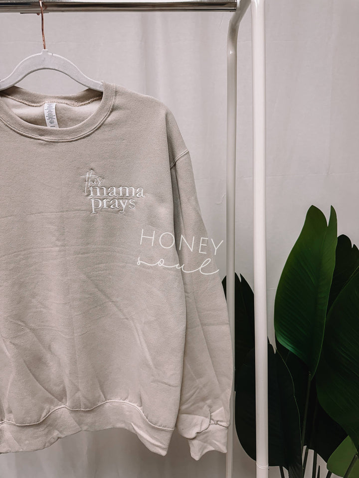 This Mama Prays Embroidered Sweatshirt-Graphic Sweaters-Honey Soul LLC-Shop with Bloom West Boutique, Women's Fashion Boutique, Located in Houma, Louisiana