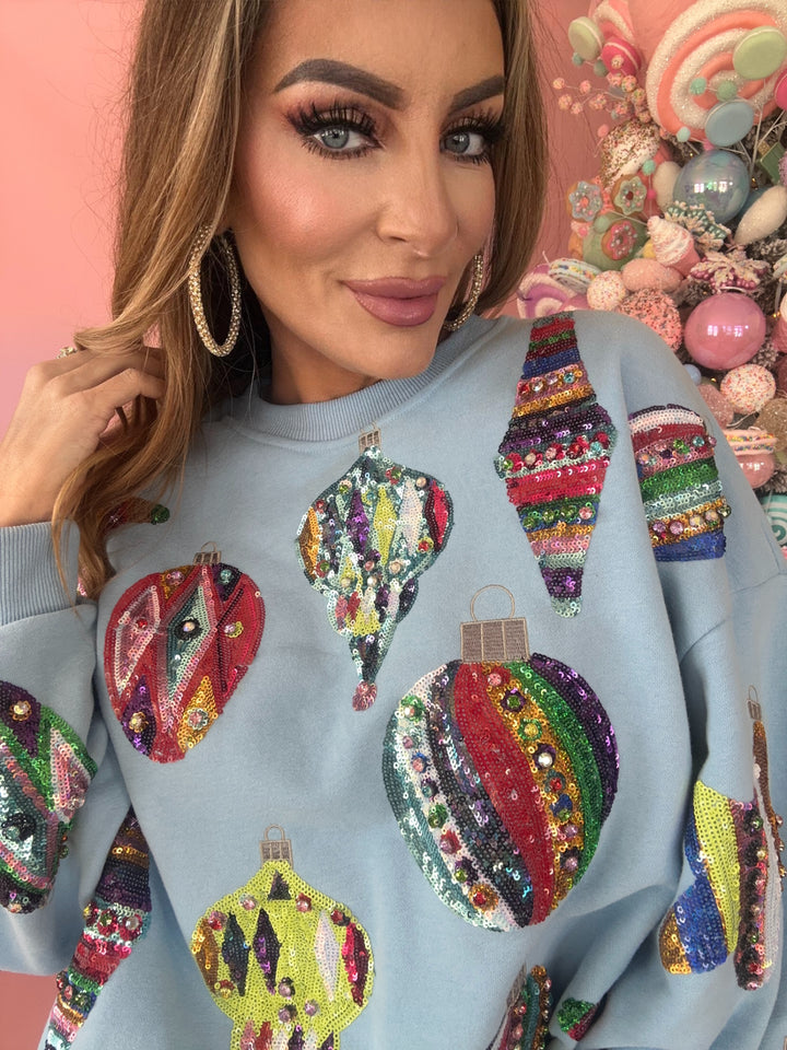 Queen Of Sparkles Light Blue Multi Color Ornaments Sweatshirt-QOS Tops-Queen Of Sparkles-Shop with Bloom West Boutique, Women's Fashion Boutique, Located in Houma, Louisiana