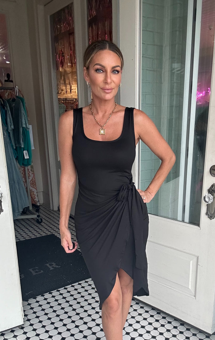 Black View. Gilda Wrap Front Tie Side Midi Dress-Midi Dresses-Capella Apparel-Shop with Bloom West Boutique, Women's Fashion Boutique, Located in Houma, Louisiana