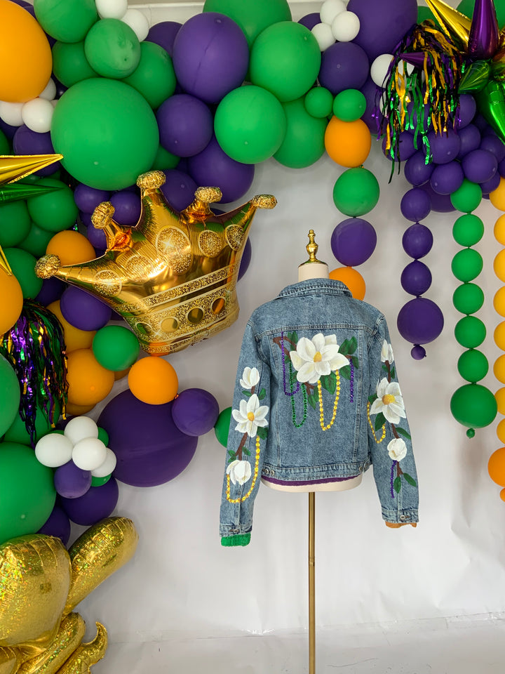 Magnolias on Mardi Denim Jacket PRE-ORDER-Jackets-Bloom West Boutique-Shop with Bloom West Boutique, Women's Fashion Boutique, Located in Houma, Louisiana