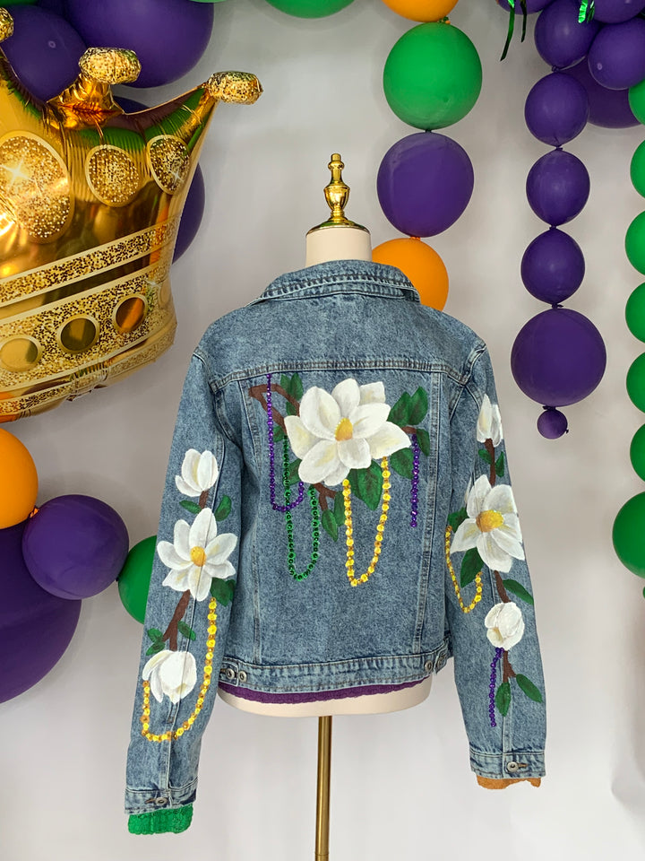 Magnolias on Mardi Denim Jacket PRE-ORDER-Jackets-Bloom West Boutique-Shop with Bloom West Boutique, Women's Fashion Boutique, Located in Houma, Louisiana