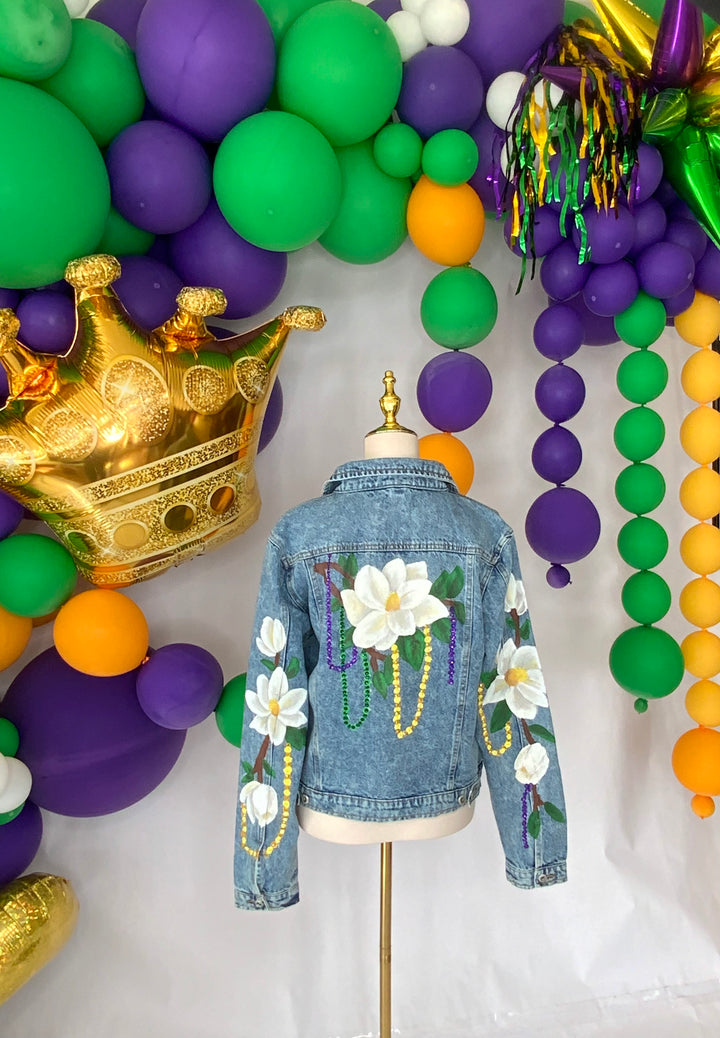 Magnolias on Mardi Denim Jacket PRE-ORDER-Jackets-Bloom West Boutique-Shop with Bloom West Boutique, Women's Fashion Boutique, Located in Houma, Louisiana
